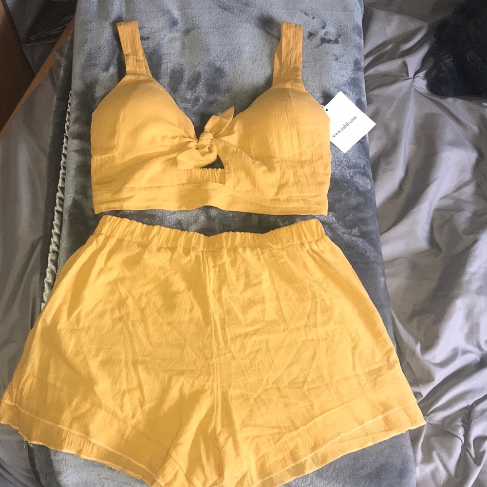New w tag 2 piece set! Shorts and tank size M